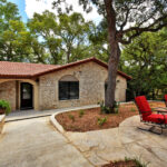 Courtyard located outside La Siena Creekside Suite at Messina Inn a Wimberley Texas Hotel