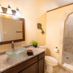 En Suite Bathroom with Walk-in Shower of La Grotta Messina Inn Wimberley Texas Hill Country Hotel